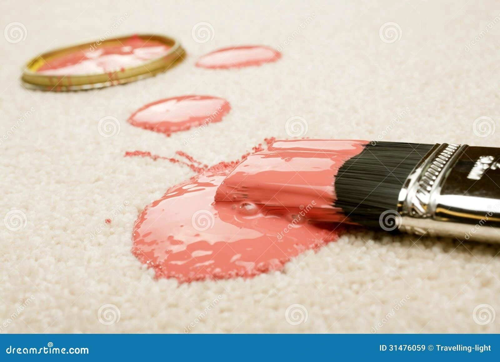 Pink paint spill on cream carpet